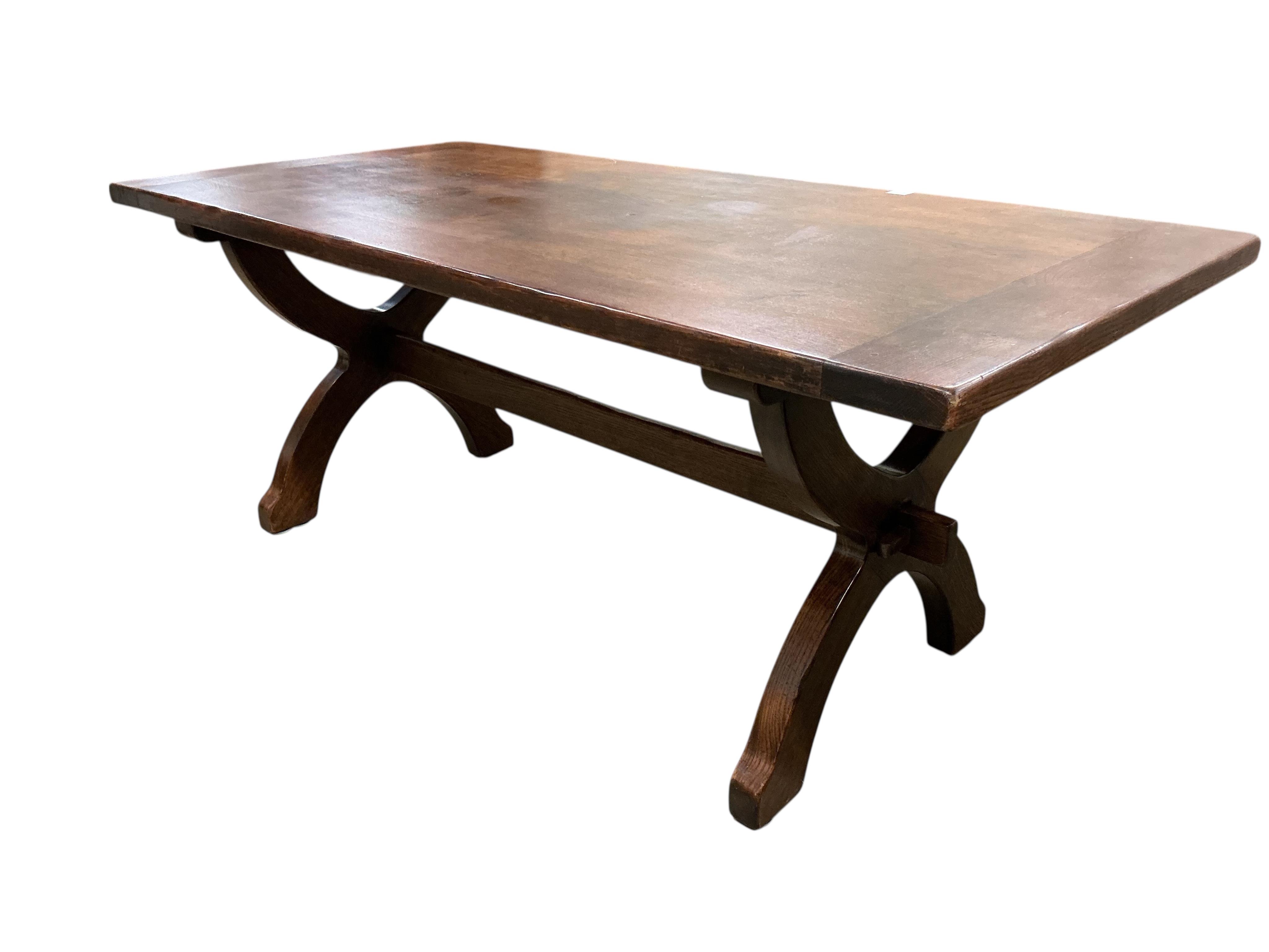 An 18th century style rectangular oak tavern or refectory dining table, width 197cm, depth 95cm, height 76cm